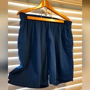 Calvin Klein men's swim trunks beautiful blue with black mesh lining XL